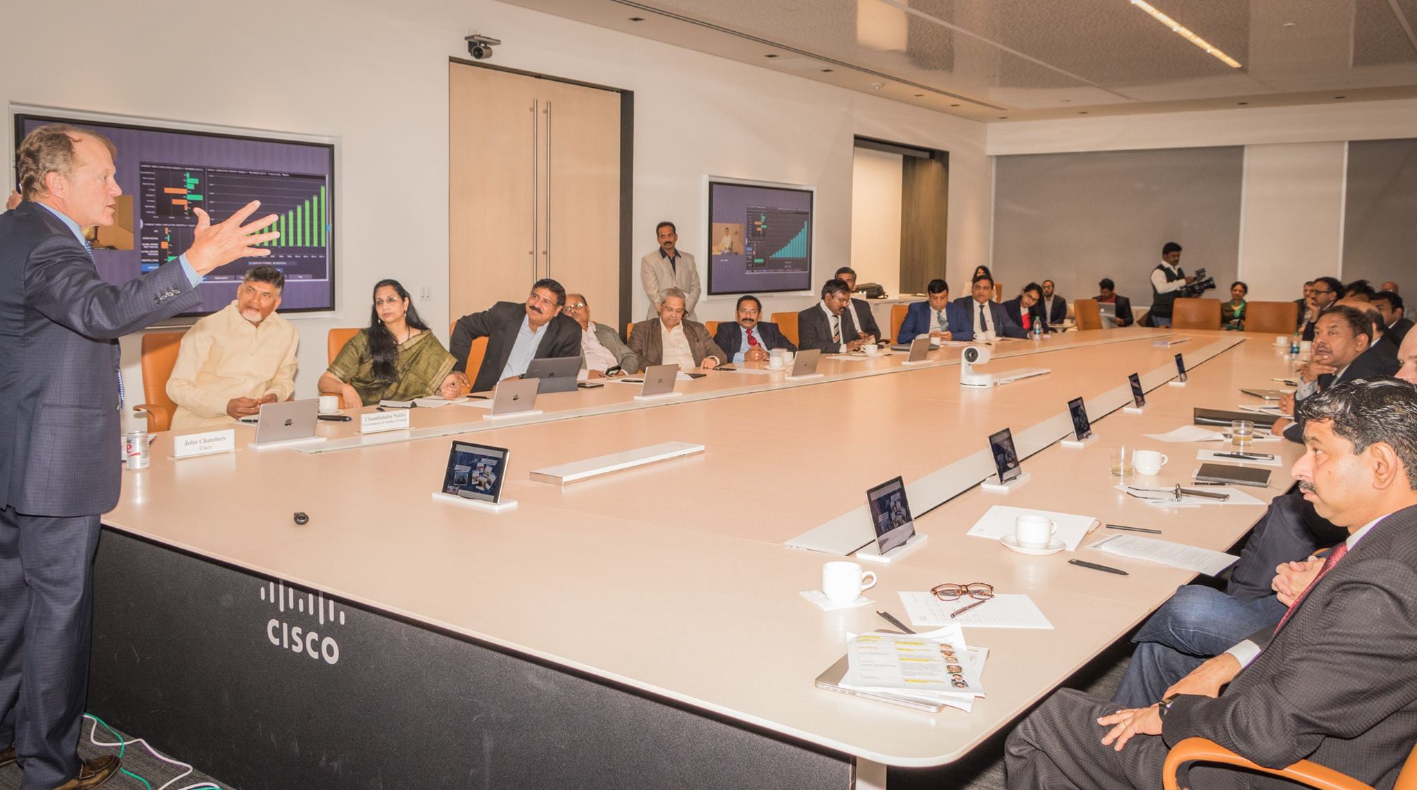 Cisco System chairman John Chambers gives presentation to Andhra Pradesh chief minister N Chandrababu Naidu and Indian IT delegation at Cisco headquarters.
