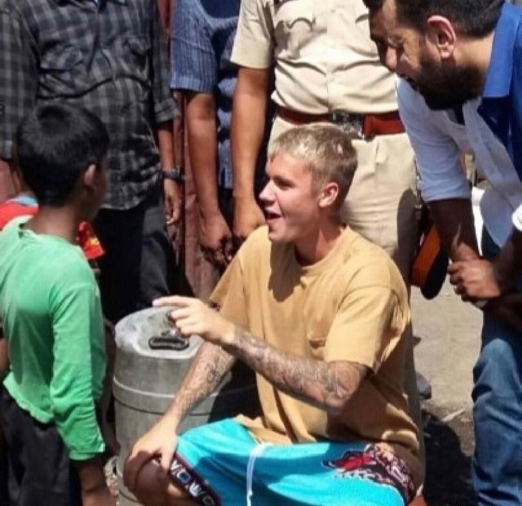 Justin Bieber interacting with underprivileged kids in Mumbai.