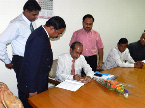 Dr Pravin Shingare (signing the paper), head of the Directorate of Medical Education and Research. 