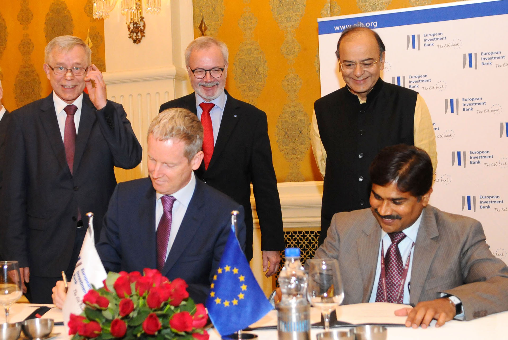 Union Minister for Finance and Corporate Affairs Arun Jaitley and President, European Investment Bank (EIB), Dr Werner Hoyer smile as the look over the signing ceremony of opening of the EIB's India office in New Delhi