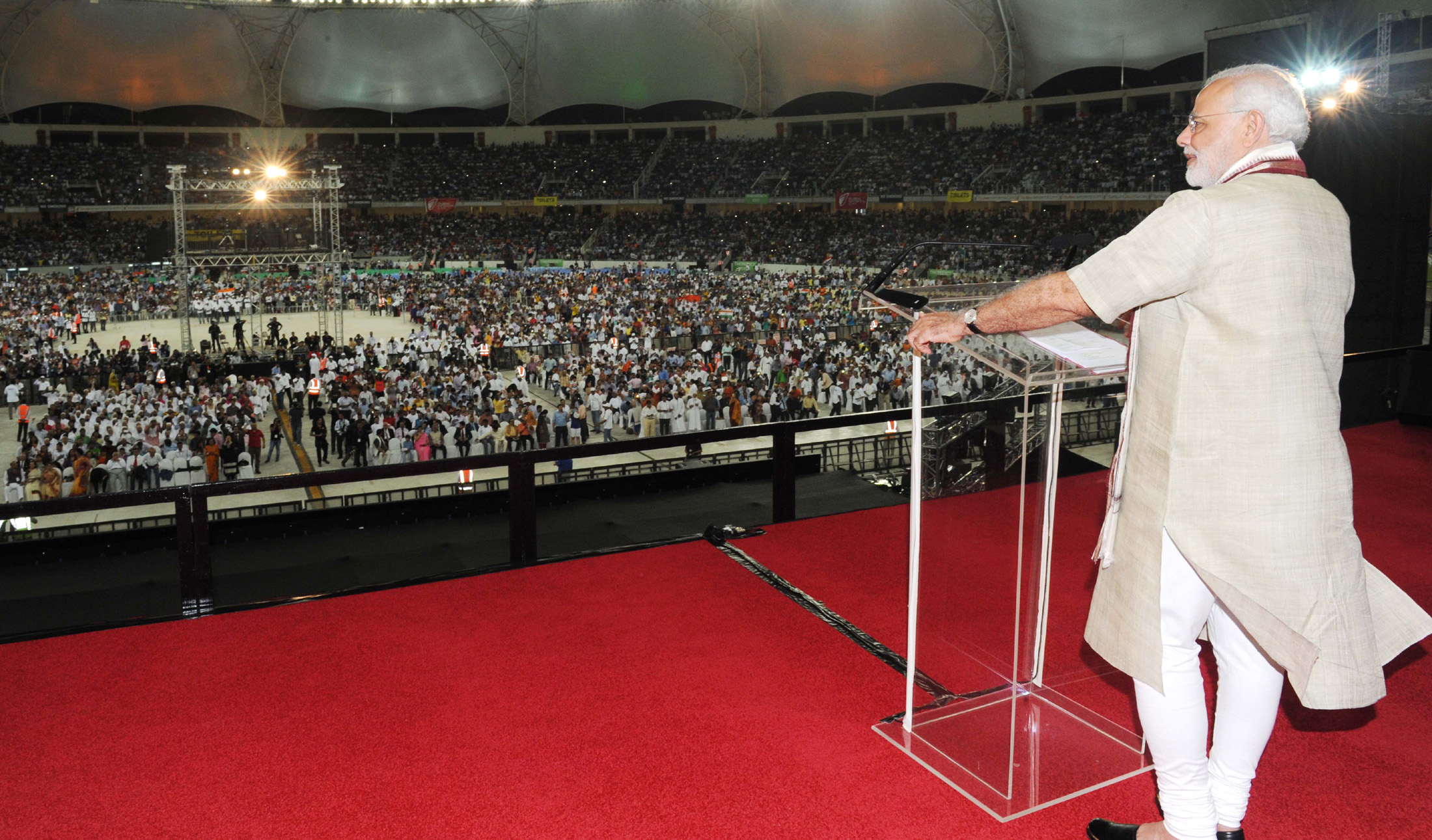 Indian Prime Minister Narendra Modi announced Indian Community Welfare Fund for those is distress while addressing the Indian Community Reception in Dubai Cricket Stadium, UAE. Photo Courtesy: PIB