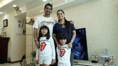 Mr Savio Coutinho and family, with their new Samsung 55-inch UHD Smart TV. Photo courtesy: Singtel TV
