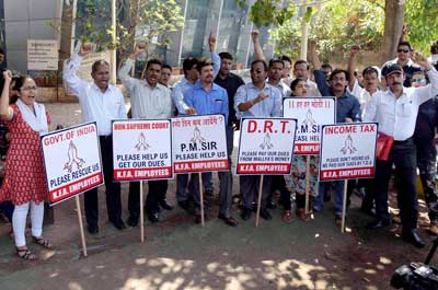 Employees of Kingisher Airlines belonging to Mallya demanding payment of salaries.
