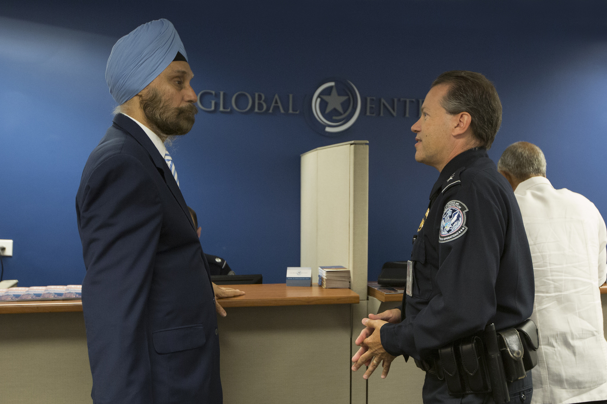 Indian Ambassador to US Navtej Sarna interacting with US Customs and Border Protection officers after he became the first Indian to enroll in Global Entry Program. 