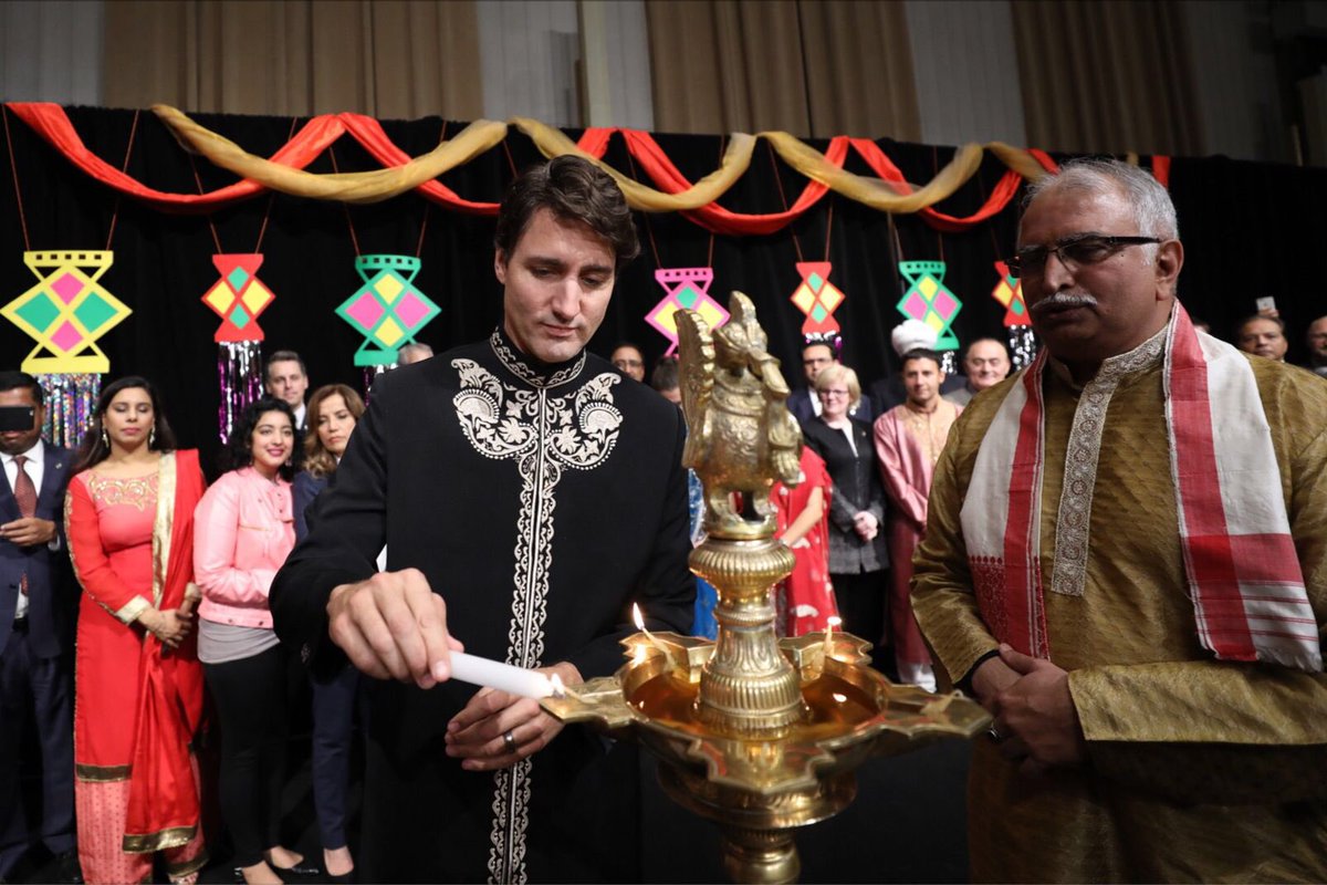 Canada PM Justin Trudeau lighting the lamp for Diwali.