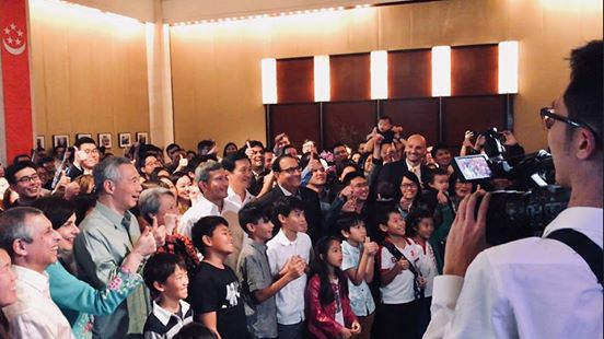 PM Lee Hsien Loong meeting Singaporeans during a reception held in his honour at the Singaporean embassy in Washington. 