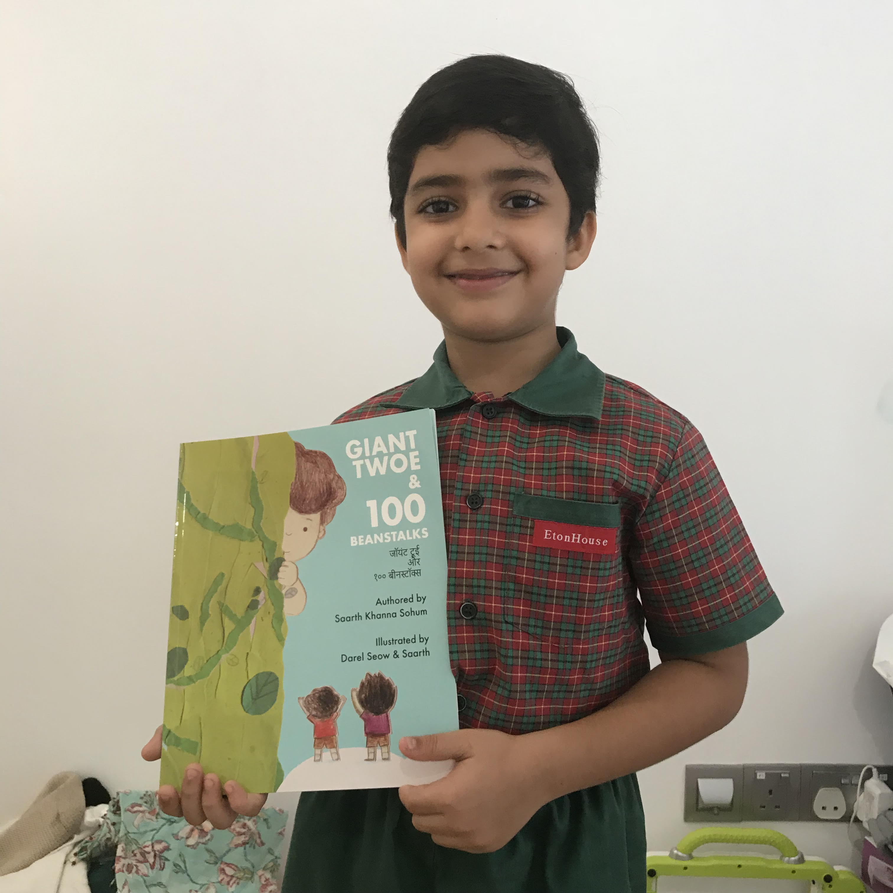 Saarth Khanna Sohum with the book he has written, 'Giant Twoe and 100 Beanstalks'. 