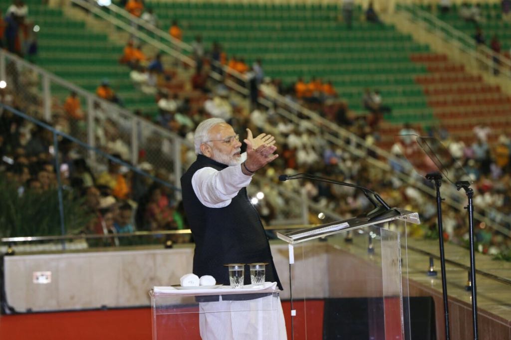 Indian Prime Minister Narendra Modi addressing a massive gathering of the Indian diaspora at the Sultan Qaboos Sports Complex in Muscat during his first visit to Oman. Sultan Qaboos accorded a very special honour to PM to address the community from the Royal Box. 