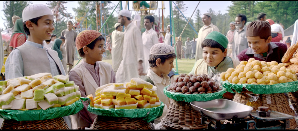 The scene of the delicious sweets tempts children but the orphan boy Hamid purchases tongs for his grandmother which is effectively portrayed in the film. Photo courtesy: DIFF 