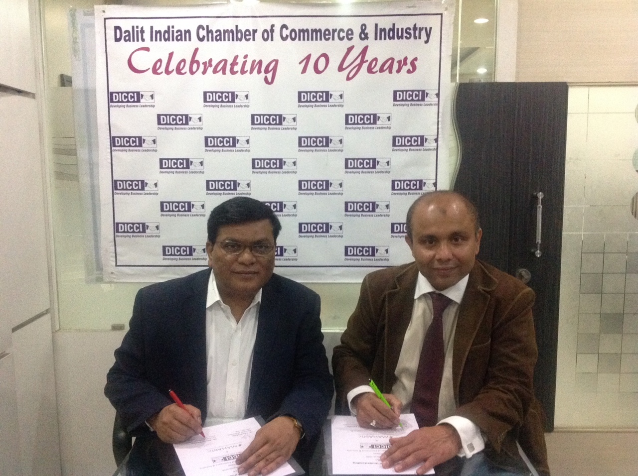 Milind Kamble, Founder & Chairman, DICCI (left) with Dr Tausif Malik. 