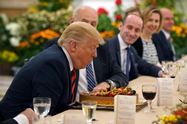 President Trump cuts his birthday cake at the working lunch hosted by Singapore PM Lee Hsien Loong at the Istana Palace today ahead of Trump-Kim summit tomorrow.