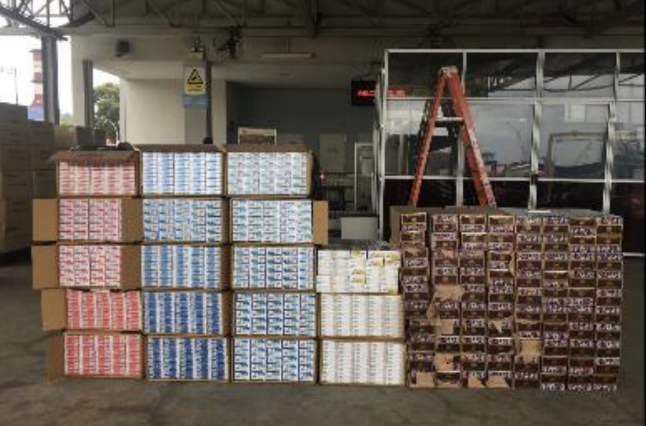 Duty-unpaid cigarettes uncovered from the Singapore-registered lorry. Photo courtesy: ICA