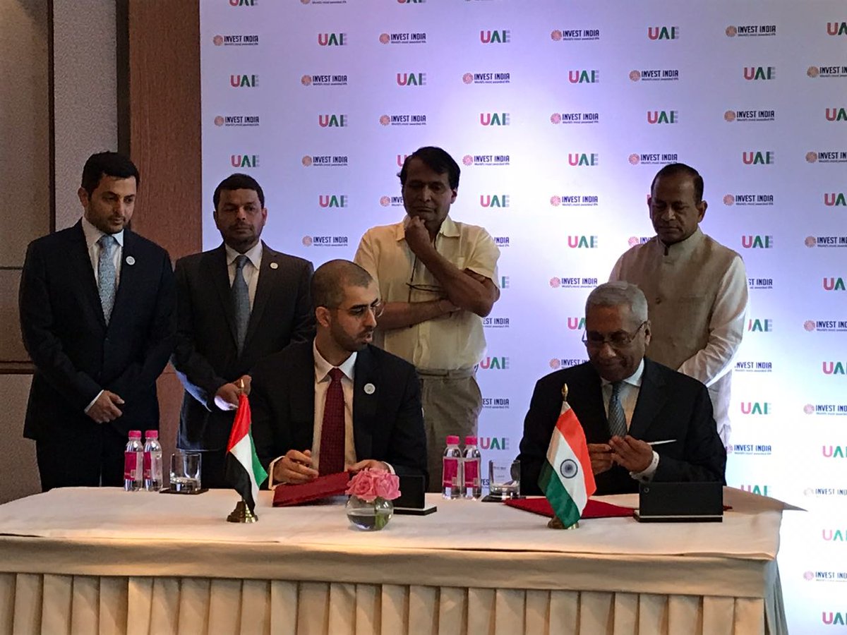 Omar Bin Sultan Al Olama, Minister of Artificial Intelligence, UAE, and Deepak Bagla, MD and CEO, Invest India, sign an MoU on Blockchain, AI and Analytics to improve overall governance through convergence (Photo courtesy: Invest India