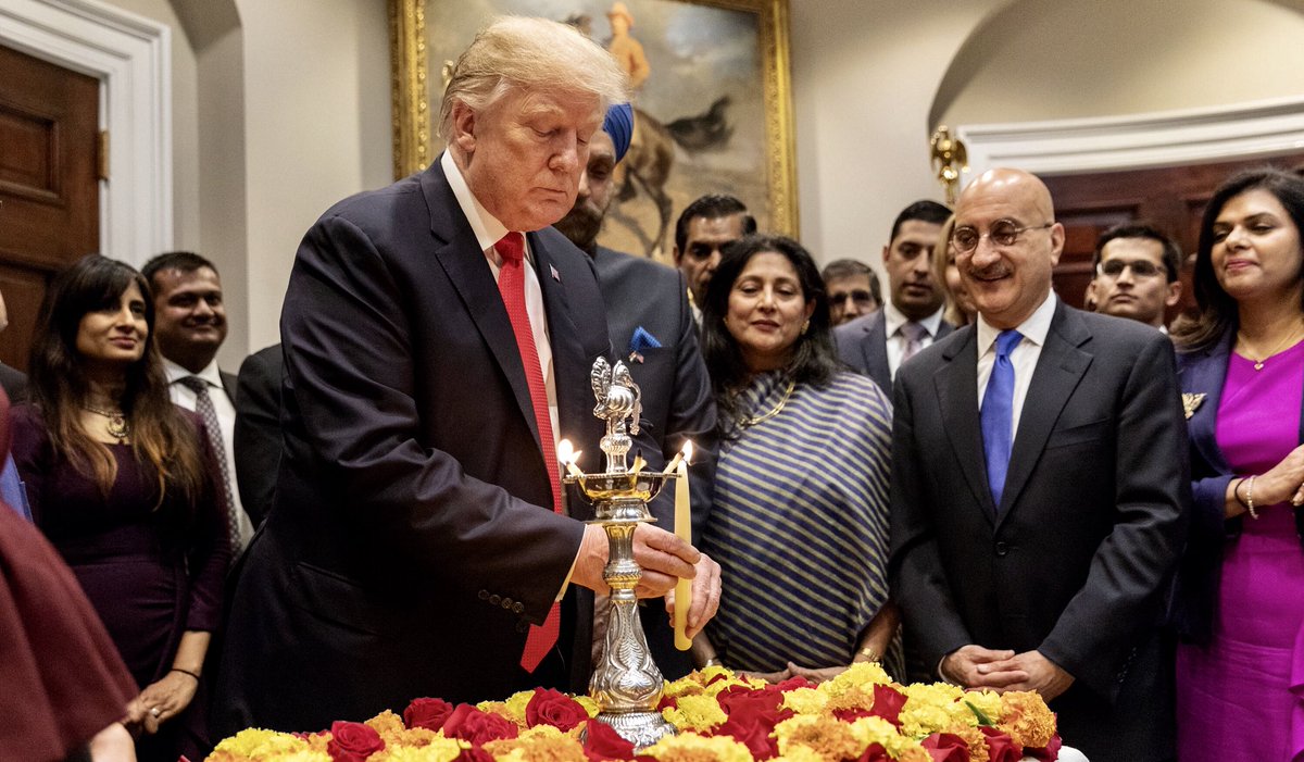 US President Donald Trump lighting the ceremonial diya in the historic Roosevelt Room of the White House while celebrating Deepawali. Photo courtesy: Twitter@/realDonaldTrump