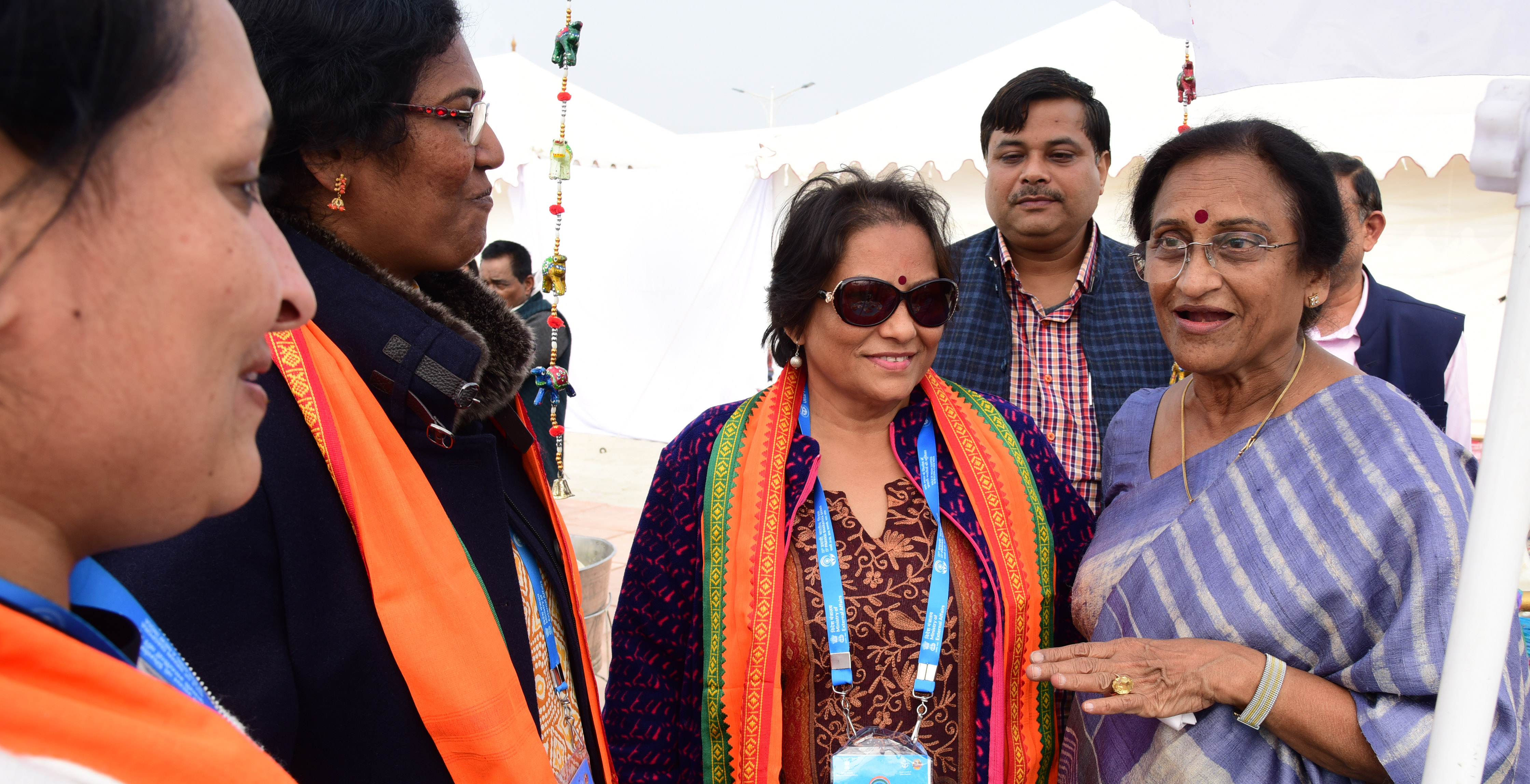 Women NRIs interacting with Rita Bahuguna Joshi, Tourism Minister of Uttar Pradesh (extreme right) in the Kumbh Mela area. Photo: Connected to India