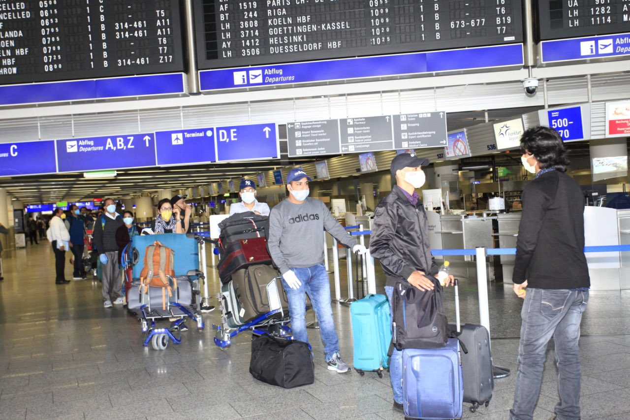 Indian citizens line up for a repatriation flight from Frankfurt to Delhi. Photo courtesy: Twitter/@eoiberlin
